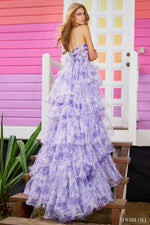 This Sherri Hill gown features an A-line silhouette with tulle floral fabric. The keyhole in the bodice and ruffle skirt with train are the feminine details that make this train truly unique. This dress could be perfect for your next prom or formal event.   Sherri Hill 55980