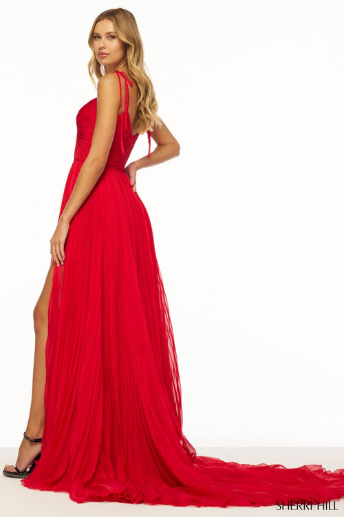 This dress features a sweetheart neckline with a pleated bodice and knot and spaghetti straps.This gown has chiffon fabric that flows effortlessly with skirt slit and train. It is effortless and vibrant and could be perfect for your next prom, pageant or formal event.  Sherri Hill 56267