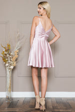 This cocktail dress features a V-neckline with spaghetti straps, a satin fabric and a flowy skirt with pockets. Style this dress to make it your own at your next homecoming or formal event.

ACE BZ013S