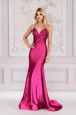 This dress features a V-neckline with spaghetti straps and an open lace-up back. The silhouette is a fit and flare with stone embellishments throughout the bodice and torso that trickle down the skirt. This is an excellent choice for your next prom or formal event.   ACE 3018