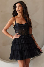 This dress features an intricate bodice with pleating, corset boning and sequin fabric, a tiered tulle skirt creating an A-line silhouette. This dress is playful and could be ideal for your next homecoming, sweethearts or formal event.  ACE BZ9023S