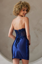 This cocktail dress features a strapless neckline with a strapless neckline, a bodice with lace applique and corset boning and a fitted silhouette. This dress is an excellent choice for your next homecoming or formal event!

ACE BZ9025S