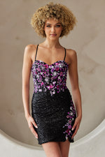 This cocktail dress features a sweetheart neckline with spaghetti straps and a lace-up back. The fitted silhouette is complimented with the sequin fabric and floral pattern on the bodice. Choose this style for your next homecoming or formal event.

ACE 7054S