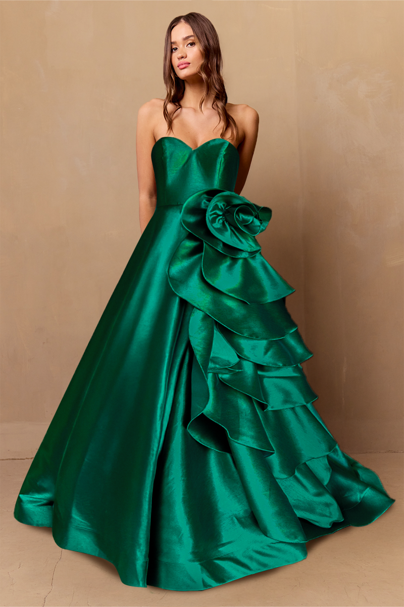 This ballgown features a strapless sweetheart neckline with an A-line silhouette. This gown has a dramatic architectural rosette along the hip that cascades down the skirt. This had red carpet vibes for your next prom or formal event.

ACE SU085