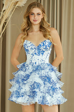 This cocktail dress features a sweetheart neckline, a bodice with corset boning, a lace-up back and a layered ruffle skirt. The print brings a unique element to this dress and could be ideal for your next homecoming or formal event.

ACE 2069S