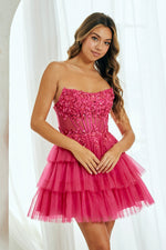 This cocktail dress features a strapless neckline, a bodice with corset boning and lace applique, and a lace-up back. The silhouette is A-line with a layered tiered skirt. Choose this dress for your next homecoming or formal event.&nbsp;

ACE 9066S