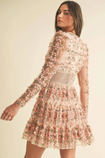 This cocktail dress features delicate floral embroidery with crochet lace trim, long sheer sleeves and a V-neckline. This dress is boho and feminine and could be ideal for your next homecoming or formal event.

EB LD1664