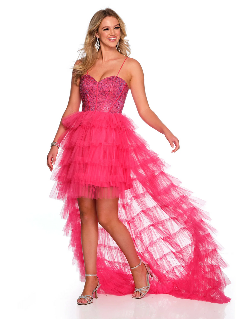 This dress features a high-low hemline with a tiered tulle skirt. The bodice is embellished with stones with exposed corset boning and spaghetti straps. This dress is playful and fun and could be ideal for your next formal event!  DJ 11174