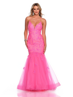 This dress features a deep v-neckline, a lace-up back and a mermaid silhouette. This gown also has sequin applique and tulle fabric. Could this be your next prom dress?    DJ 11197
