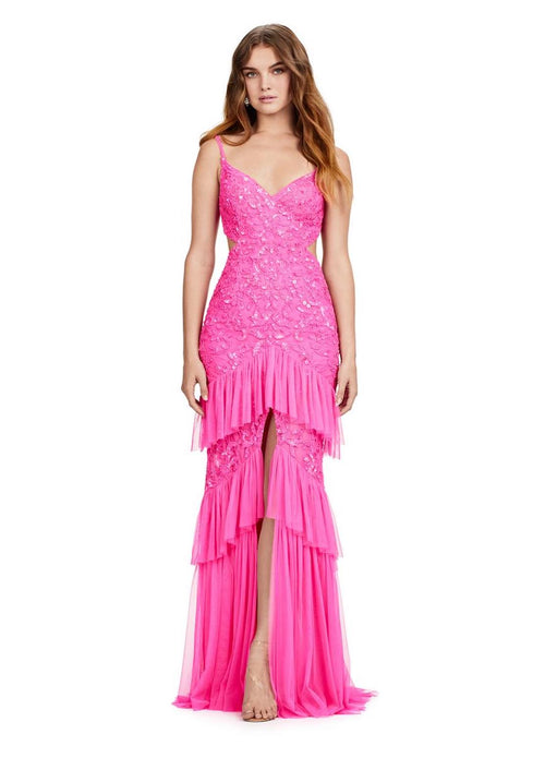 This dress features fully beaded fabric in an intricate design pattern with spaghetti straps a v-neckline and cut-out on the side to reveal an open back. This dress has stretch tulle fabric ruffles tiered throughout the skirt and a middle slit. This dress is one-of-a-kind, a stand out option for your next prom or formal event.  Ashley Lauren 11437