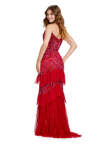 This dress features a strapless plunging v-neckline with a sequin and beaded bodice in an intricate design. This gown also has tulle layer ruffles down the skirt with a front slit. This is a unique and unforgettable dress for prom, pageant, or any formal event.  Ashley Lauren 11438
