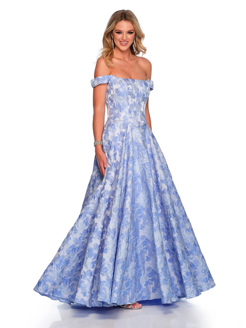 This dress features an off-the-shoulder neckline with corset boning in the bodice. It has a lac-up back and an A-line silhouette. This dress is feminine and could be ideal for your next prom or formal event.  DJ 11506