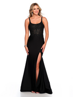 This dress features a lace-embellished bodice with corset boning, shiny stretch jersey fabric, a scoop neckline and a side slit. This dress is elegant and could be perfect for your next prom or formal event.   DJ 11584