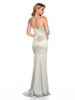 This dress features a ruched corset bodice and a ruched skirt with a crossover slit, satin fabric and spaghetti straps. This dress is a stunning choice for your next prom or formal event.  DJ 11657