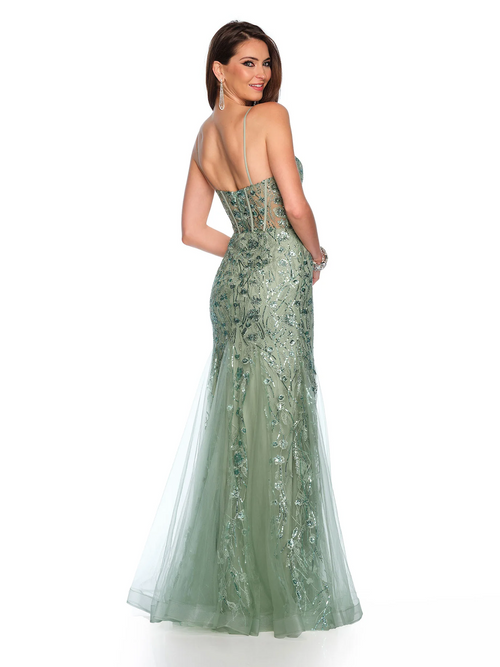 This dress features an illusion corset bodice with a mermaid-fitted skirt and a floral embroidered tulle with sequin detailing. This dress is an elegant choice for your next prom or formal event.   DJ 11658