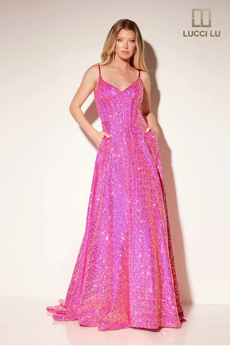 This dress features a v-neckline with spaghetti straps, a bodice with exposed corset boning, a low back and an A-line silhouette. The vibrant sequin fabric adds all the glam for this design, perfect for your next prom or formal event.  LU 1321