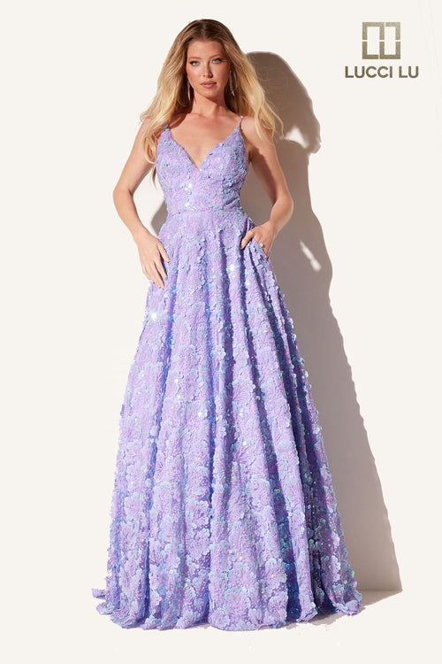 This dress features a v-neckline with spaghetti straps and a lace-up back. The fabric is sequin embellished and designed in an intricate pattern, an A-line silhouette and pockets. This dress is unique and playful and could be ideal for your next prom or formal event.  LU 1325