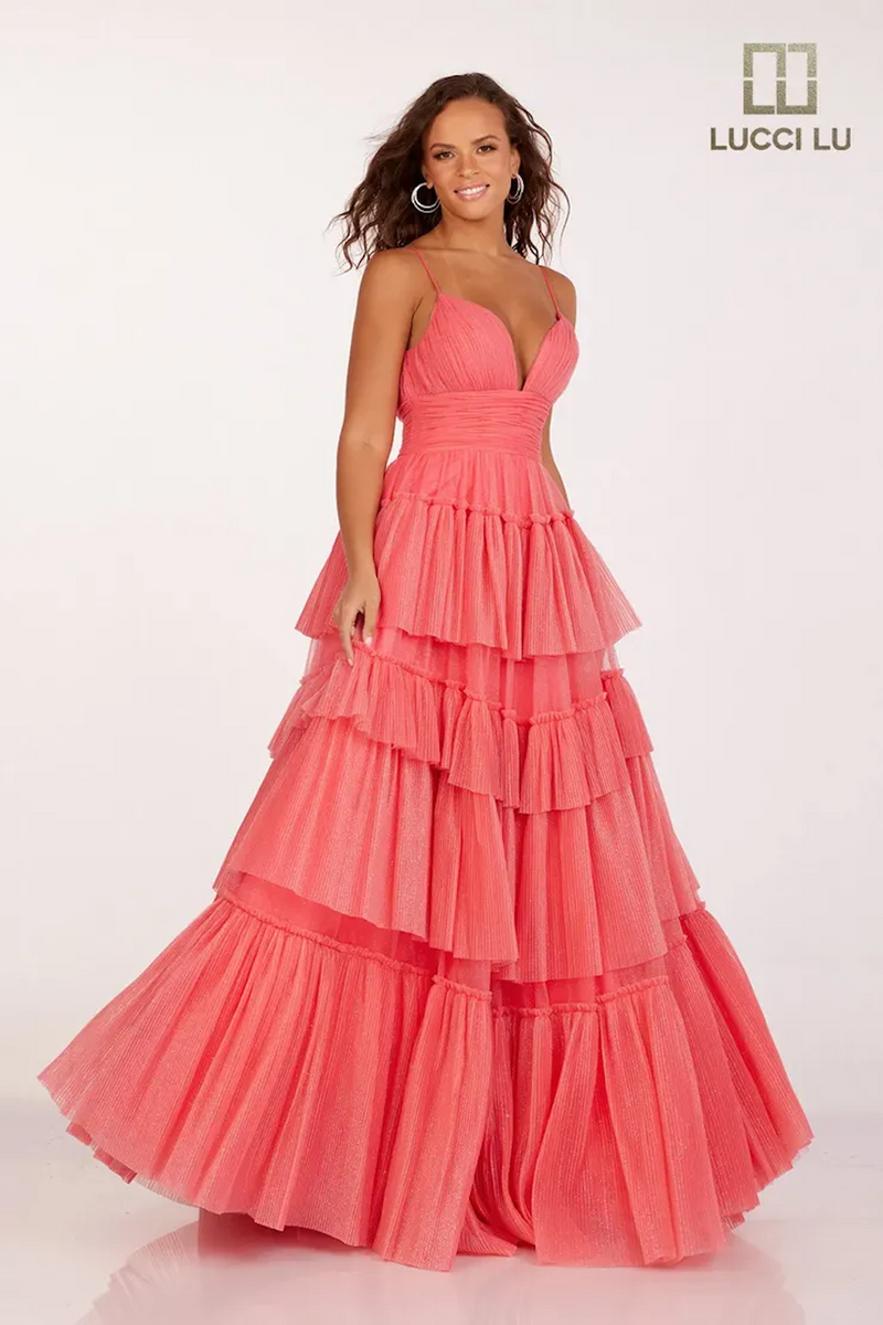 This dress features a v-neckline, an A-line silhouette, spaghetti straps, a cinched ruched waistline with a layered tulle skirt. A whimsical and playful design, this dress can be styled to make it your own at your next prom or formal event.  LU 1357