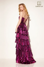 This dress features a strapless neckline and a lace-up back. The skirt has layered tiered fabric creating an A-line silhouette, all in a metallic fabric. This dress is a unique choice for your next prom or formal event.

LU 1367