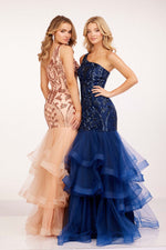 This dress features a one-shoulder neckline, with sequin detailing on the torso, and a mermaid silhouette with layered tulle on the skirt. This dress is a show-stopper and could be ideal for your next prom or formal event.   CAC 1593