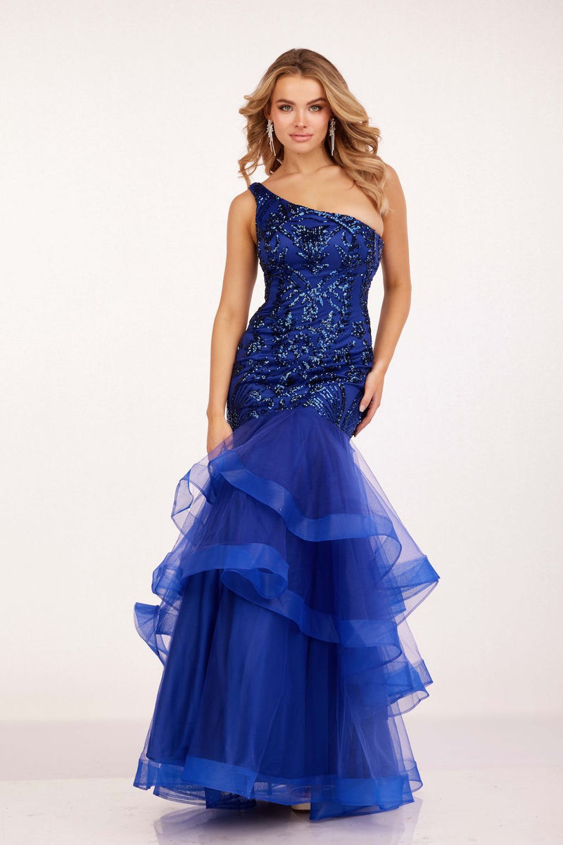 This dress features a one-shoulder neckline, with sequin detailing on the torso, and a mermaid silhouette with layered tulle on the skirt. This dress is a show-stopper and could be ideal for your next prom or formal event.   CAC 1593