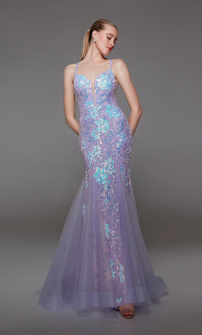 This dress features an illusion-plunging neckline with double spaghetti straps, an open lace-up back, and a fitted silhouette with sequin embellished tulle fabric in a floral pattern. This dress is unique and could be your next prom or formal event dress.   Alyce 1822