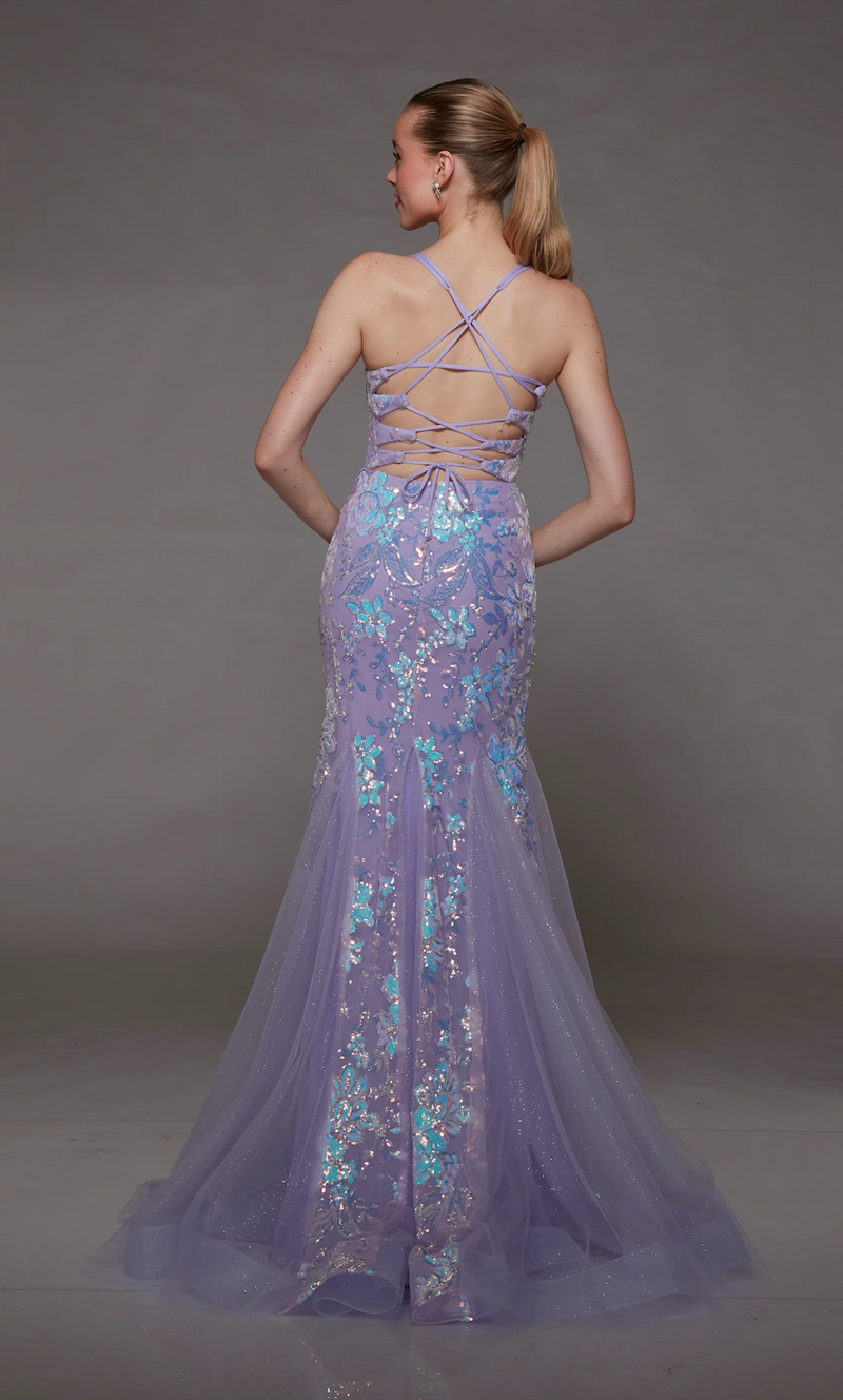 This dress features an illusion-plunging neckline with double spaghetti straps, an open lace-up back, and a fitted silhouette with sequin embellished tulle fabric in a floral pattern. This dress is unique and could be your next prom or formal event dress.   Alyce 1822