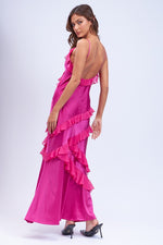 This dress features satin fabric with ruffle trim lines, spaghetti straps, a side zipper and scoop back. This dress is unique and playful and could be ideal for your next sweethearts or homecoming dance.  SM-D20530A