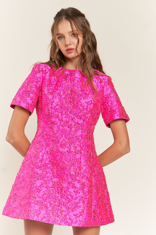 <p>This modest cocktail dress features a brocade-style fabric with a short sleeve, a high neckline, a fully covered back, and an A-line silhouette. This dress is cute and modern and could be styled to make it your own at your next homecoming, sweethearts dance or formal event.</p> <p>ITB D10042</p>