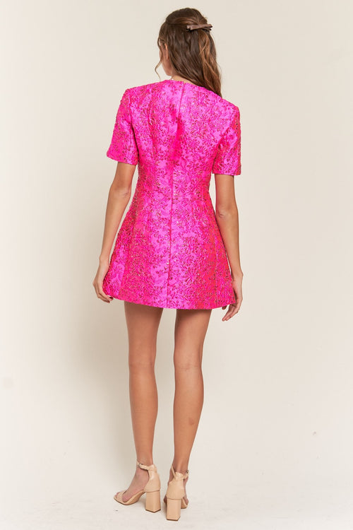 <p>This modest cocktail dress features a brocade-style fabric with a short sleeve, a high neckline, a fully covered back, and an A-line silhouette. This dress is cute and modern and could be styled to make it your own at your next homecoming, sweethearts dance or formal event.</p> <p>ITB D10042</p>