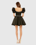 This cocktail dress features a diamond-embellished satin fabric. Fully lined with a bustier for coverage, while the sweetheart neckline and puff sleeves add a touch of femininity. Complete with sparkly rhinestone top and waist detail for a flattering fit for your next homecoming or formal event.

Mac Duggal 20688