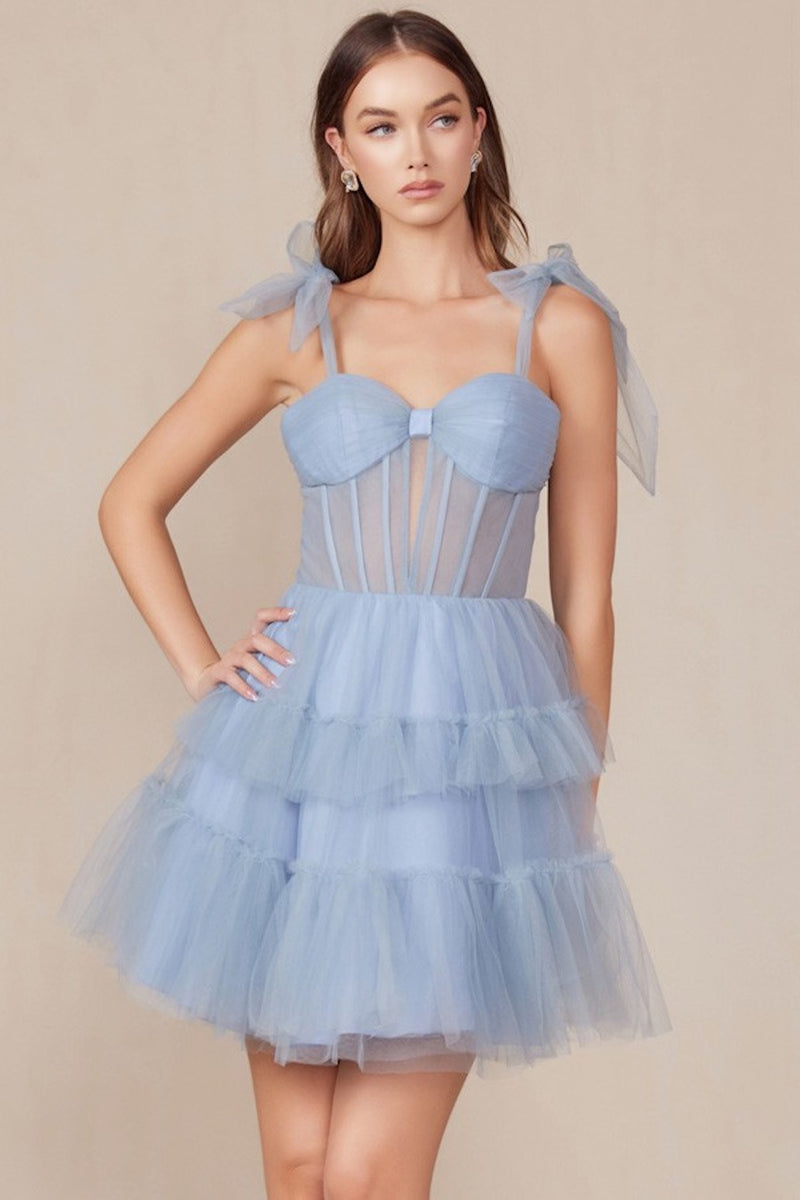 This cocktail dress features tulle fabric with a tiered ruffle skirt, tie shoulder straps, with a sheer corset bodice. This dress is playful and could be just the vibe for your next homecoming or formal event.  BFX Y858
