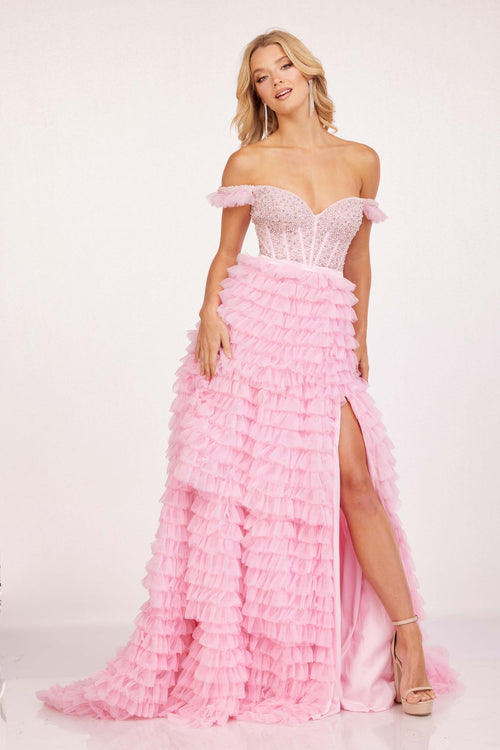 This dress features a sweetheart neckline with off-the-shoulder straps, a bodice embellished with pearls and crystal beading, and corset boning. The skirt features tiered ruffle fabric and a slit with a lace-up back. This dress is unique and playful and could be your dream dress at your next prom or formal event.   CAC 2224