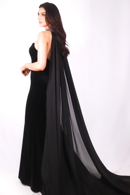 This dress features a strapless neckline, a fitted silhouette and a cape with a bejeweled neckline. A stunning choice for your next pageant or formal event!  ARY 27713