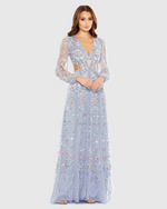 This gown features long sleeves and intricate embellishments and a V-neckline. With its A-line silhouette and cut-out details, it adds a modern touch to a classic design that could be perfect for your next prom or formal event.

Mac Duggal 35107