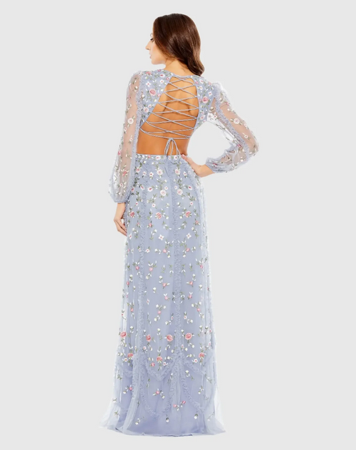 This gown features long sleeves and intricate embellishments and a V-neckline. With its A-line silhouette and cut-out details, it adds a modern touch to a classic design that could be perfect for your next prom or formal event.

Mac Duggal 35107