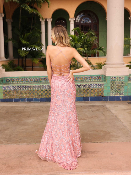 This dress features fully sequin embellished fabric, a lace-up back and a side slit. The side slit completes this design for a stunning choice for your next prom or formal event.   PV 4161