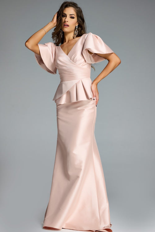 This dress features a V-neckline with short sleeves, a peplum and pleating detailing with a fitted silhouette and a covered back. This dress is unique and could be ideal for your next pageant or formal event.

Jovani 43805A