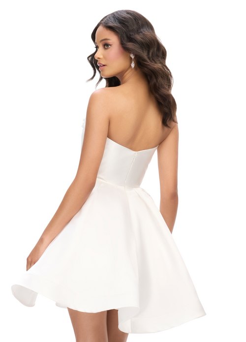 This cocktail dress features a stunning sweetheart neckline with 3D flower detailing and A-Line skirt, with mikado fabric. Style this dress to make it your own at your next homecoming or formal event.  Ashley Lauren 4782