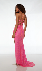 This dress features sequin fabric, a straight across neckline, a fitted silhouette, a strappy back, ruching detail gathered to the side, a side slit, and a train. This dress has all the details to wow at your next prom or formal event.  Alyce 61519