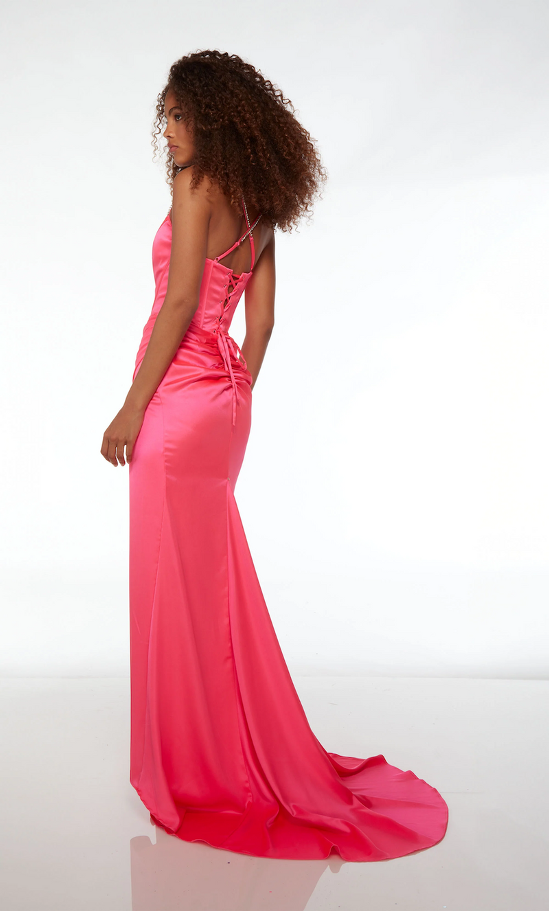 This dress features satin fabric, a square neckline with crystal embellished spaghetti straps, a lace-up back, a bodice with corset boning, a slightly off-center slit, and a detachable side train. This gown is an elegant choice for your next prom or formal event.   Alyce 61522
