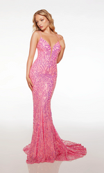 This dress features a plunging neckline with spaghetti straps, a lace-up back, a fitted silhouette with sequin embellished fabric, and a train. This dress is glamorous and unique and could be perfect for your next prom or formal event.  Alyce 61618