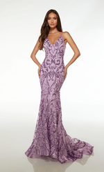 This gown features a V-neckline with an open lace-up back, spaghetti straps, a fitted silhouette, sequin embellished fabric and a train. This gown is regal and glamorous and could be styled to make it your own at your next prom or formal event.  Alyce 61659