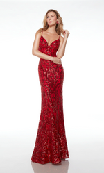 This dress features a v-neckline with dual spaghetti straps an open lace-up back and a fitted silhouette with sequin fabric intricately designed in a paisley pattern design a train. This dress is sure to stun at your next prom or formal event.  Alyce 61677