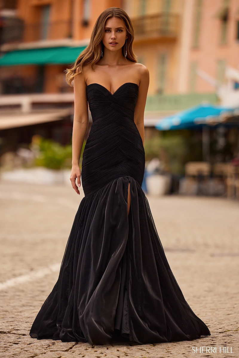 This dress features a strapless sweetheart neckline with a mermaid silhouette, metallic mesh fabric with a skirt slit. This gown is elegant and could be styled to make it your own at your next prom, pageant or formal event.

Sherri Hill 57074