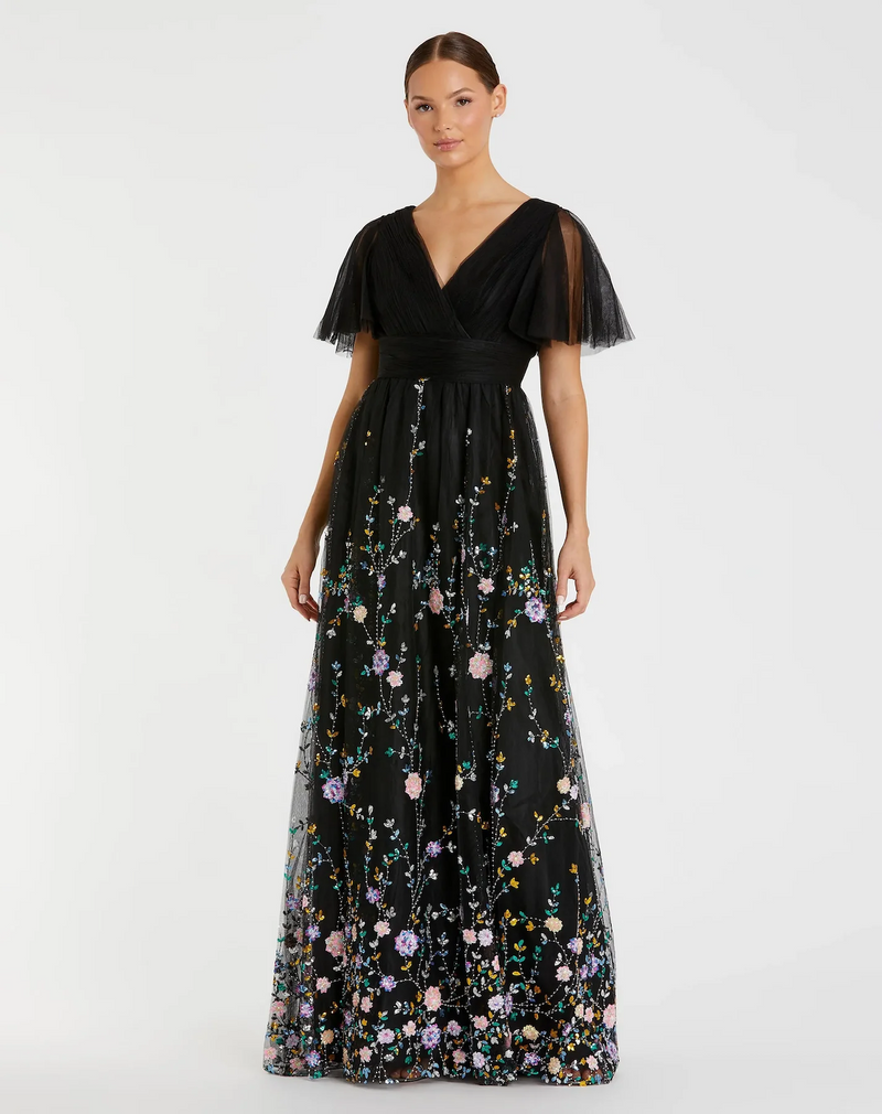 This dress features an embroidered butterfly sleeve with an empire waist. Delicate embroidery adds a touch of whimsy to this timeless silhouette. Style this dress to make it your own at your next prom or formal event.

Mac Duggal 67889