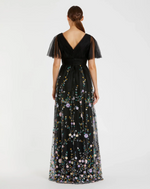 This dress features an embroidered butterfly sleeve with an empire waist. Delicate embroidery adds a touch of whimsy to this timeless silhouette. Style this dress to make it your own at your next prom or formal event.

Mac Duggal 67889