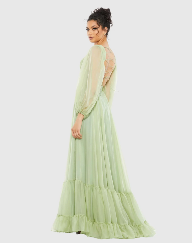 This dress features chiffon fabric, semi-sheer long sleeves, a&nbsp;V-neckline, side cut-outs, and a lace-up back. This dress is effortlessly elegant and could be ideal for your next prom or formal event!


Mac Duggal 67948