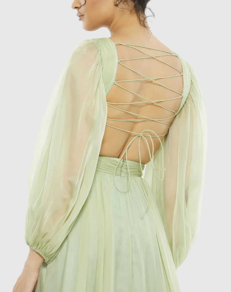 This dress features chiffon fabric, semi-sheer long sleeves, a&nbsp;V-neckline, side cut-outs, and a lace-up back. This dress is effortlessly elegant and could be ideal for your next prom or formal event!


Mac Duggal 67948