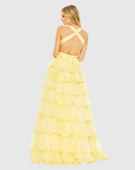 This bold prom dress is styled with a pleated bodice with a deep neckline, waist cutouts, and criss-cross center. Layers of graduated ruffles fill out the full skirt for a design that’s dramatic. Stun at your next prom or formal event in this unique ballgown.

Mac Duggal 67988